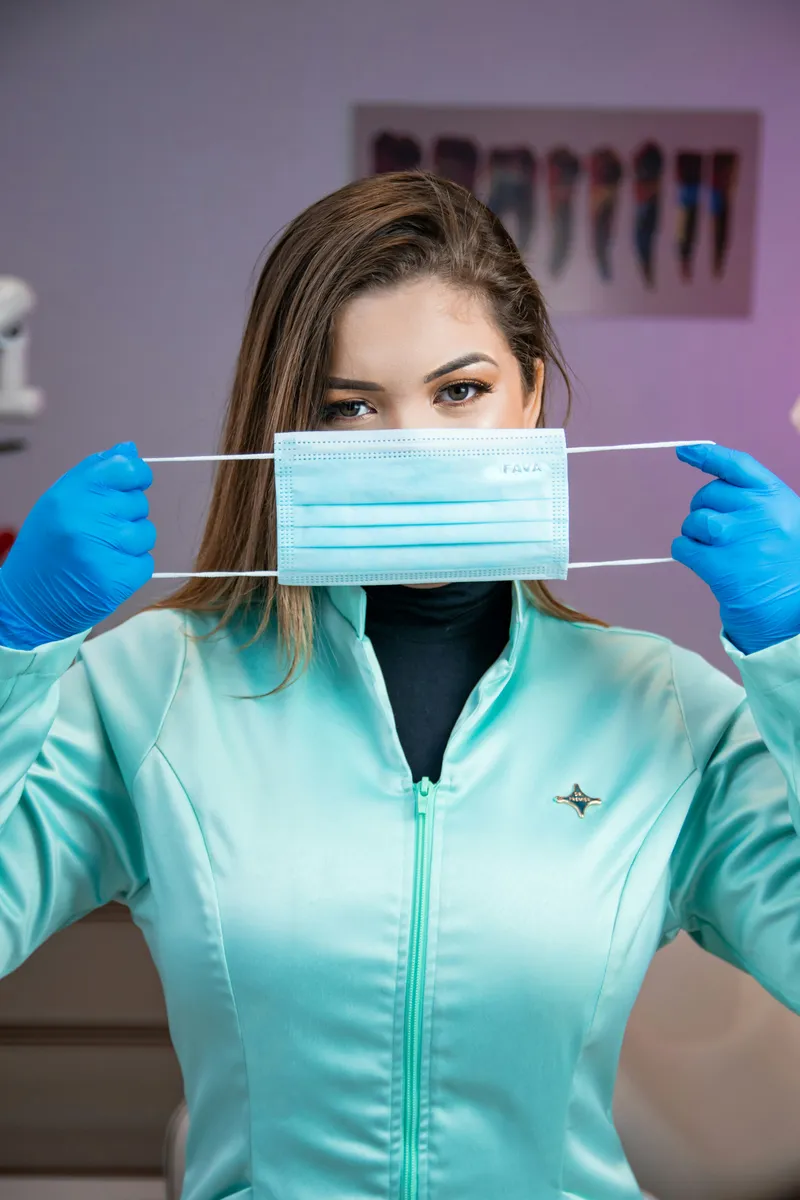 Dental professional preparing for a patient appointment